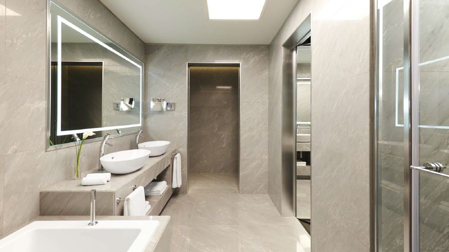 Modern bathroom interior at Excelsior Hotel Gallia in Milan, featuring sleek marble surfaces and contemporary fixtures, ideal for guests visiting the Italian Grand Prix.