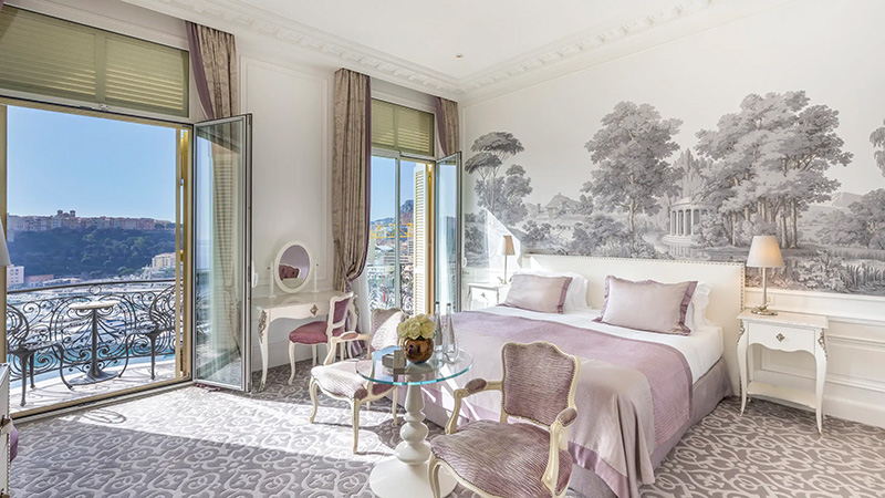 Luxuriously appointed room at the Hotel Hermitage Monaco, overlooking scenic views, ideal for Monte Carlo and Monaco Grand Prix accommodations.